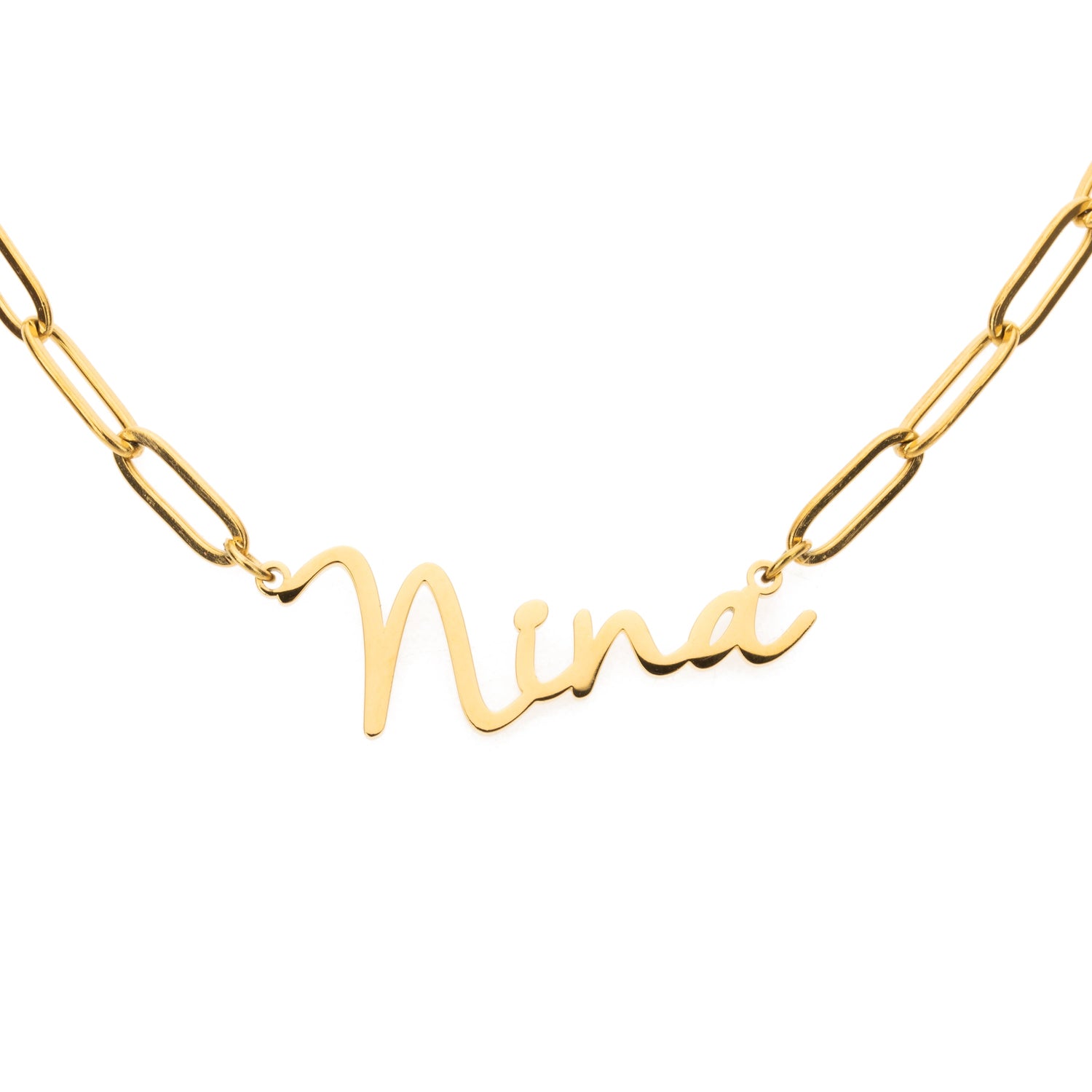 A gold-colored necklace with a script pendant that reads 'NINA'.