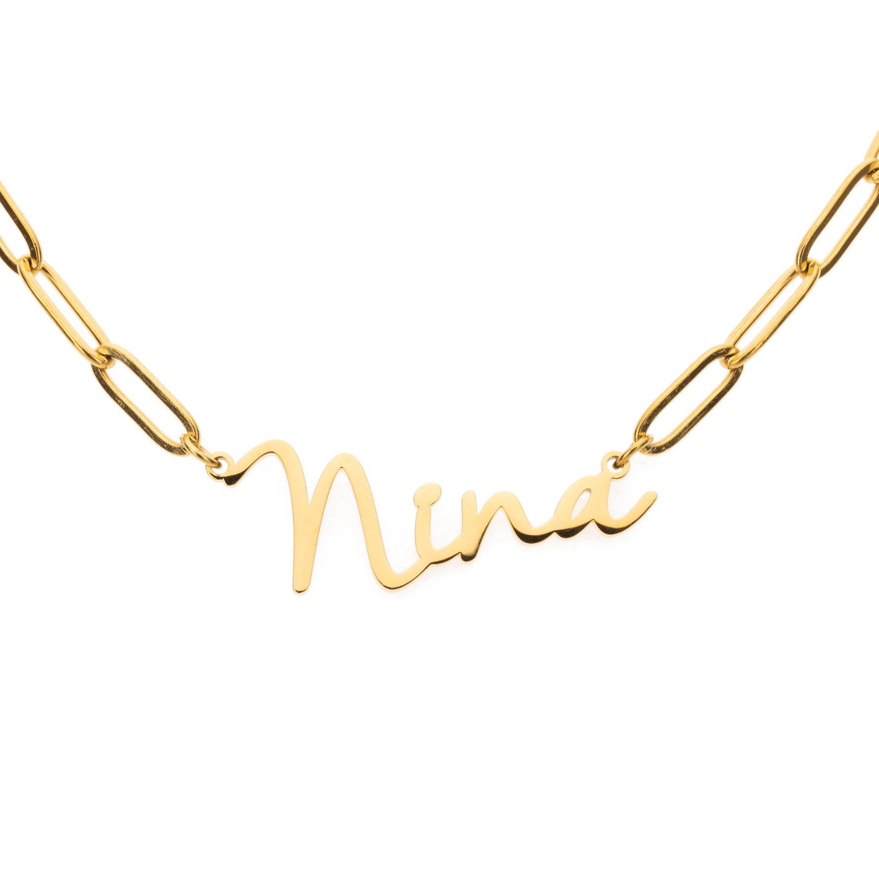 A gold-colored necklace with a script pendant that reads 'NINA'.